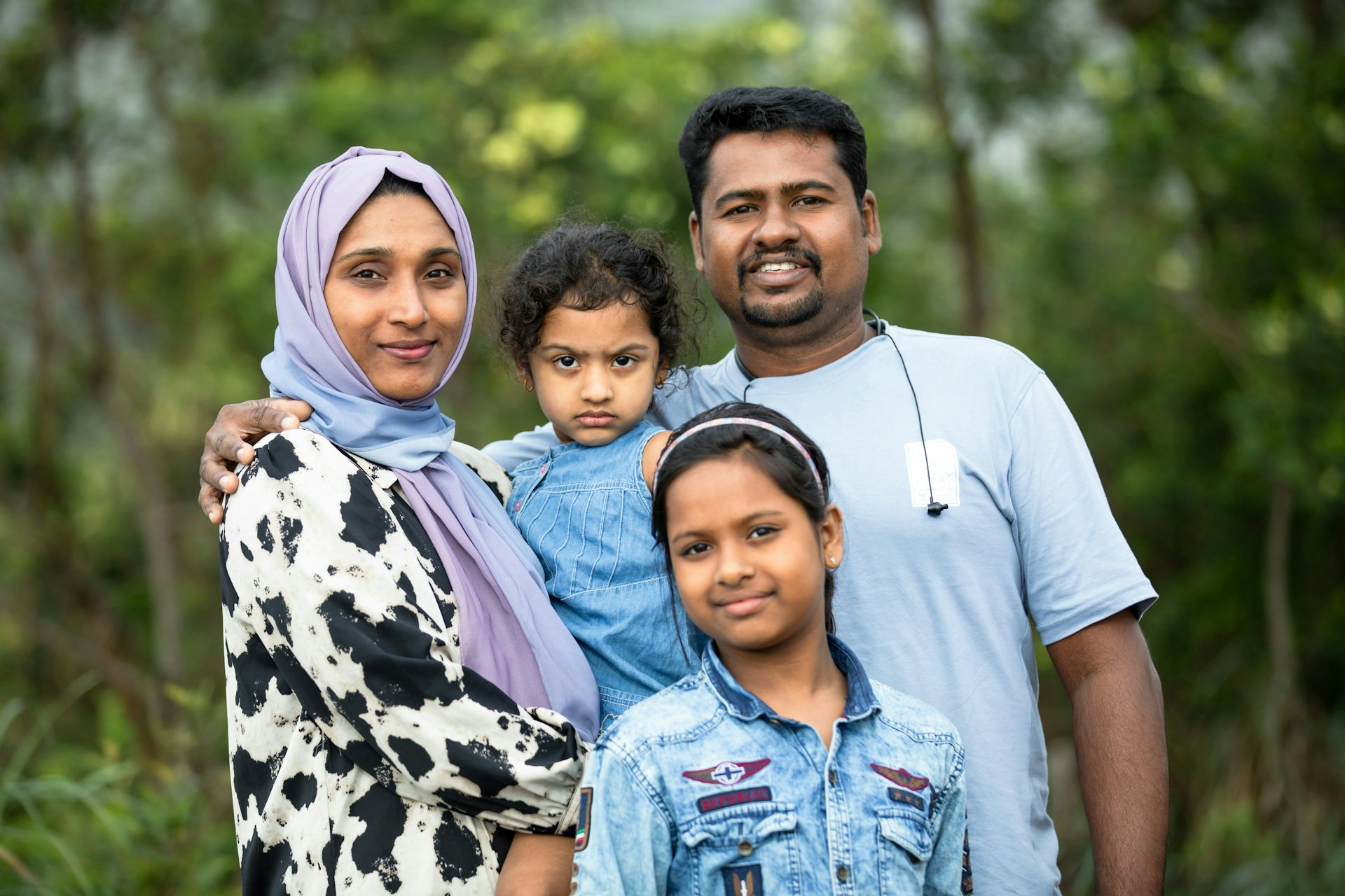 A mother, father and two children.