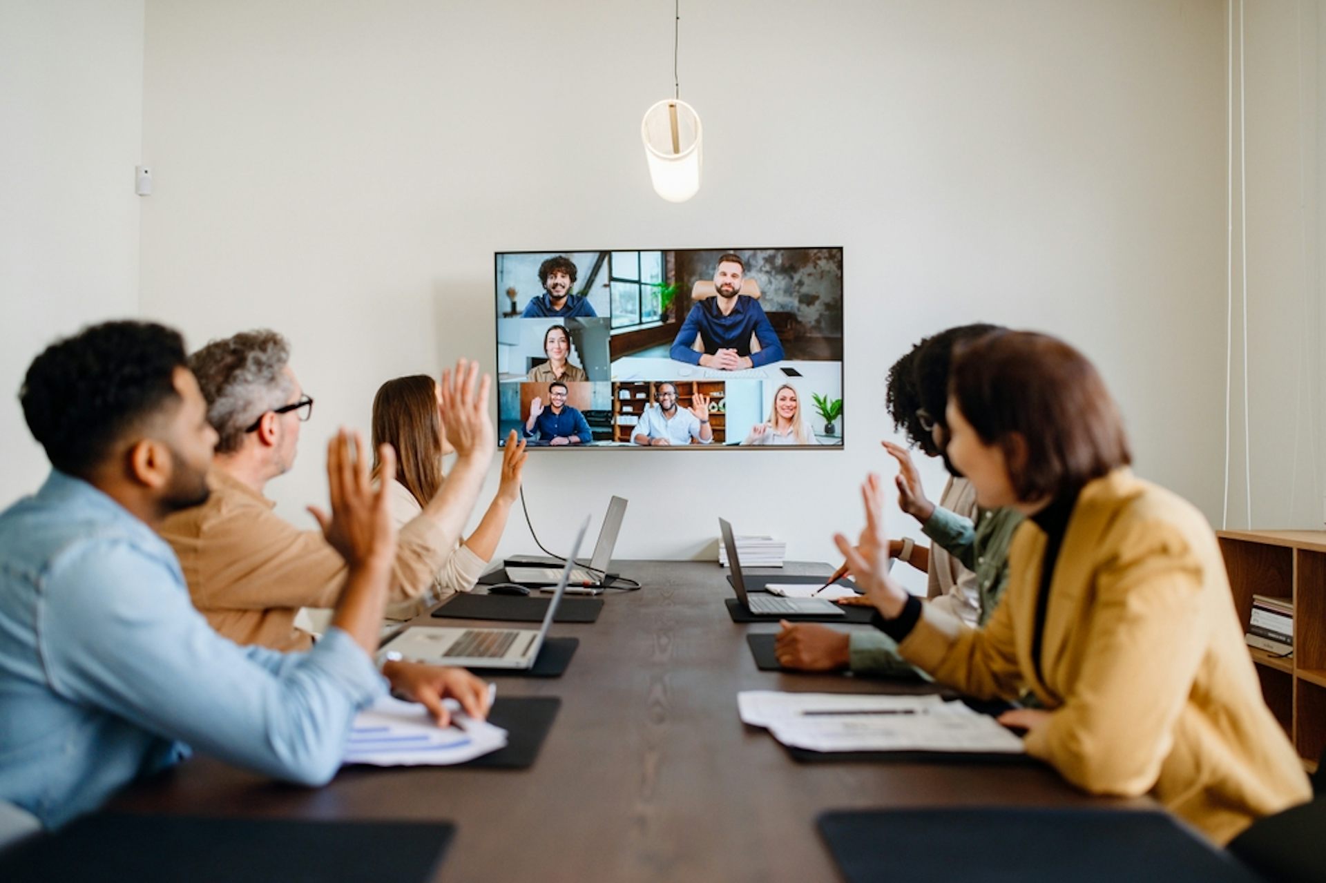 A group of office workers holding a video conference