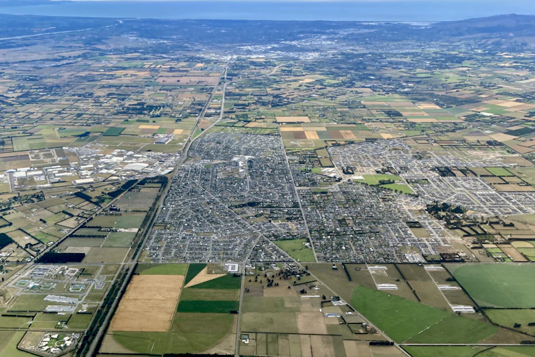 Aerial view of Rolleston with ocean in background