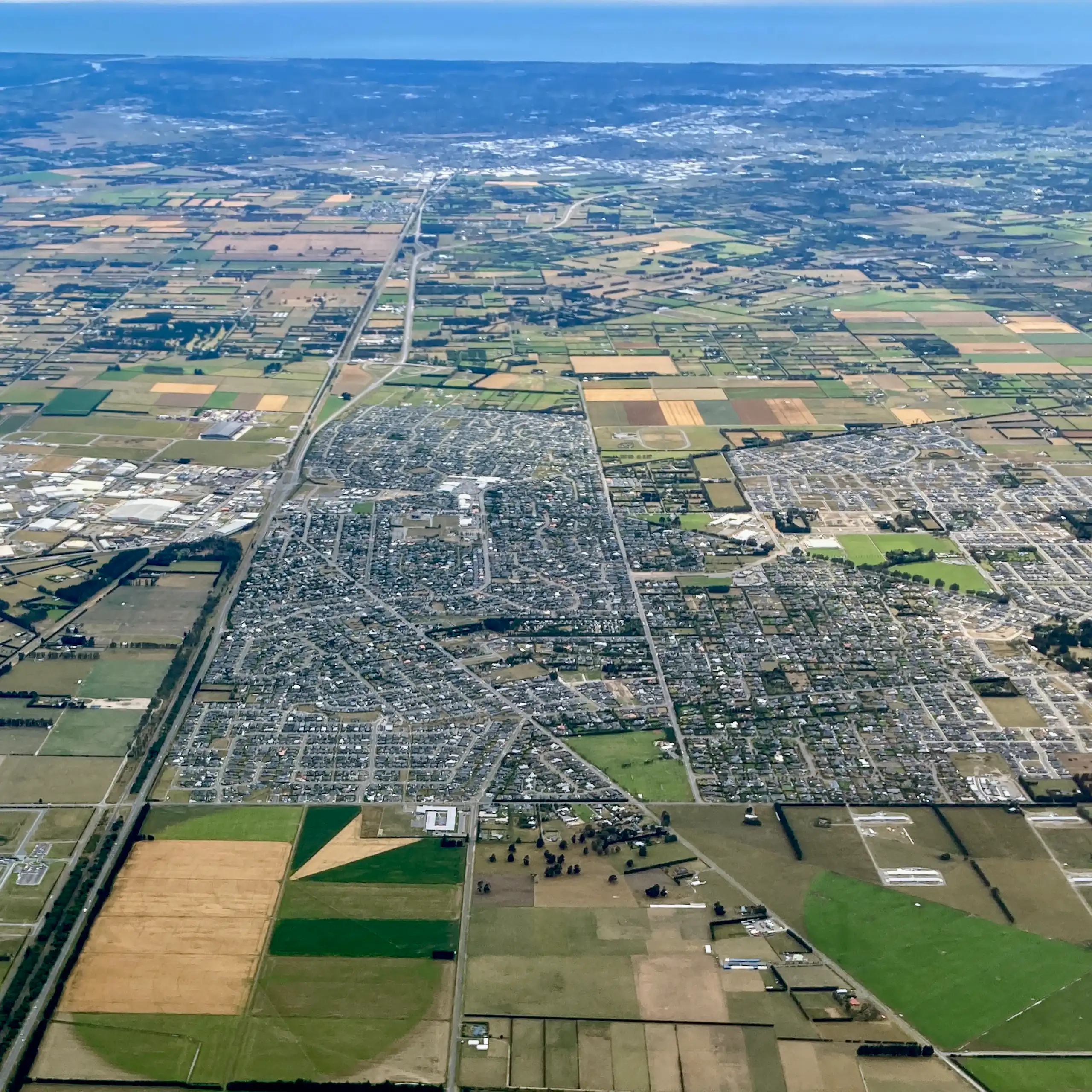 Aerial view of Rolleston with ocean in background