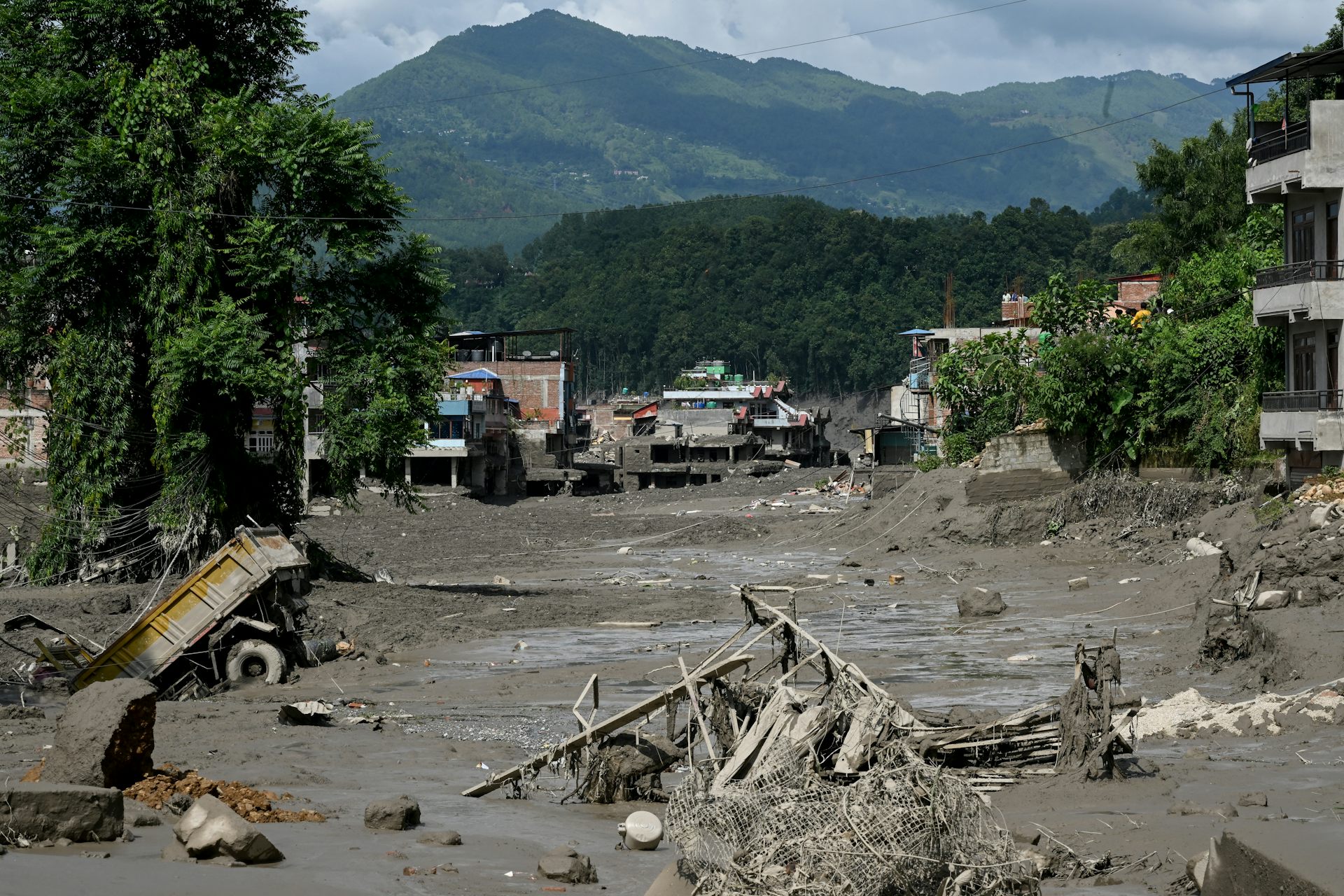 Tsunami of dirt: what caused Nepal’s deadly glacial flood?