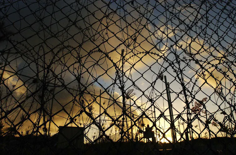 Razor wire around a detention centre