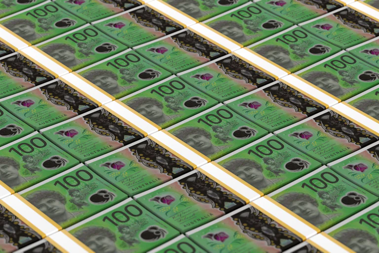 Rows and rows of stacked $100 notes