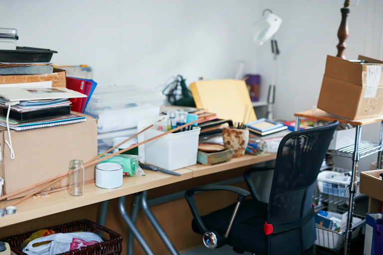 Cluttered desk in home office