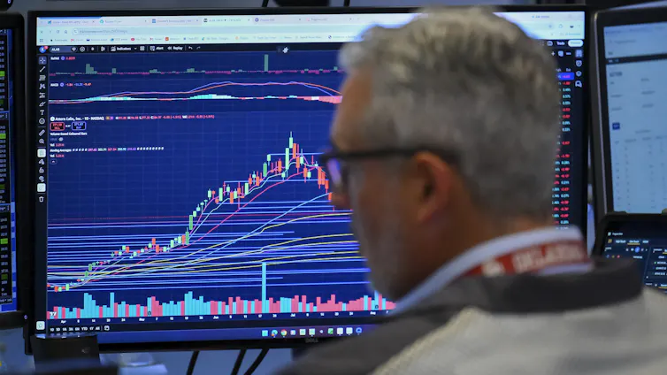 A trader works on the floor of the New York Stock Exchange