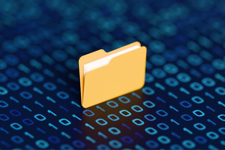 A file folder sitting on a field of ones and zeroes.