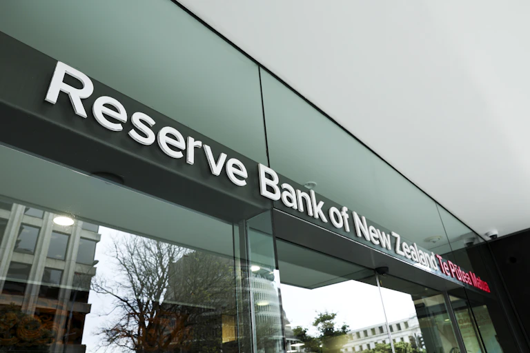 Exterior of Reserve Bank building showing sing and main doors