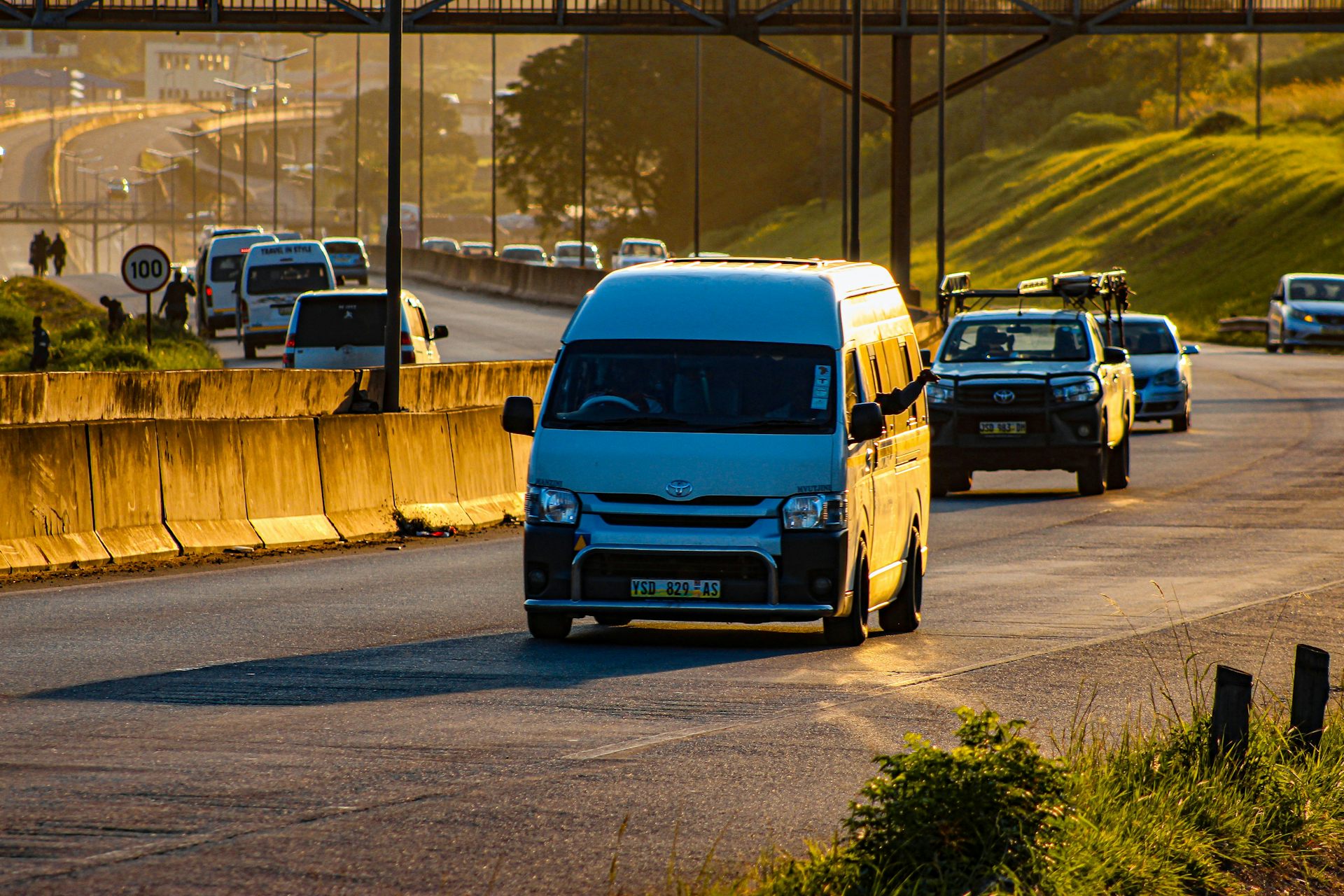 Minibus and other vehicles on a road