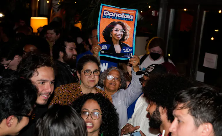 Supporters for Democratic congressional candidate Darializa Avila Chevalier celebrate during an election night watch party, June 23, 2026, in New York.