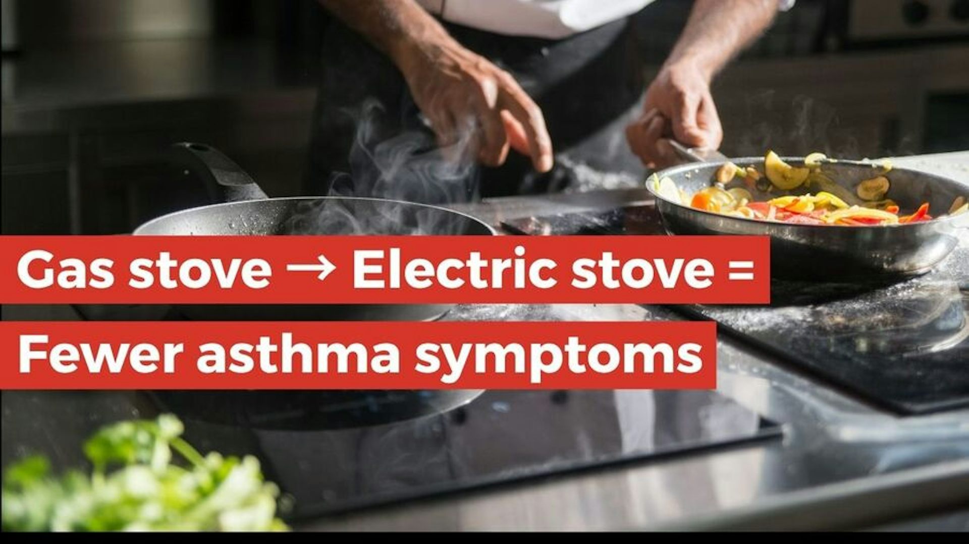 hands are seen handling a pan with food on an electric stove, with a second stove with food in the foreground
