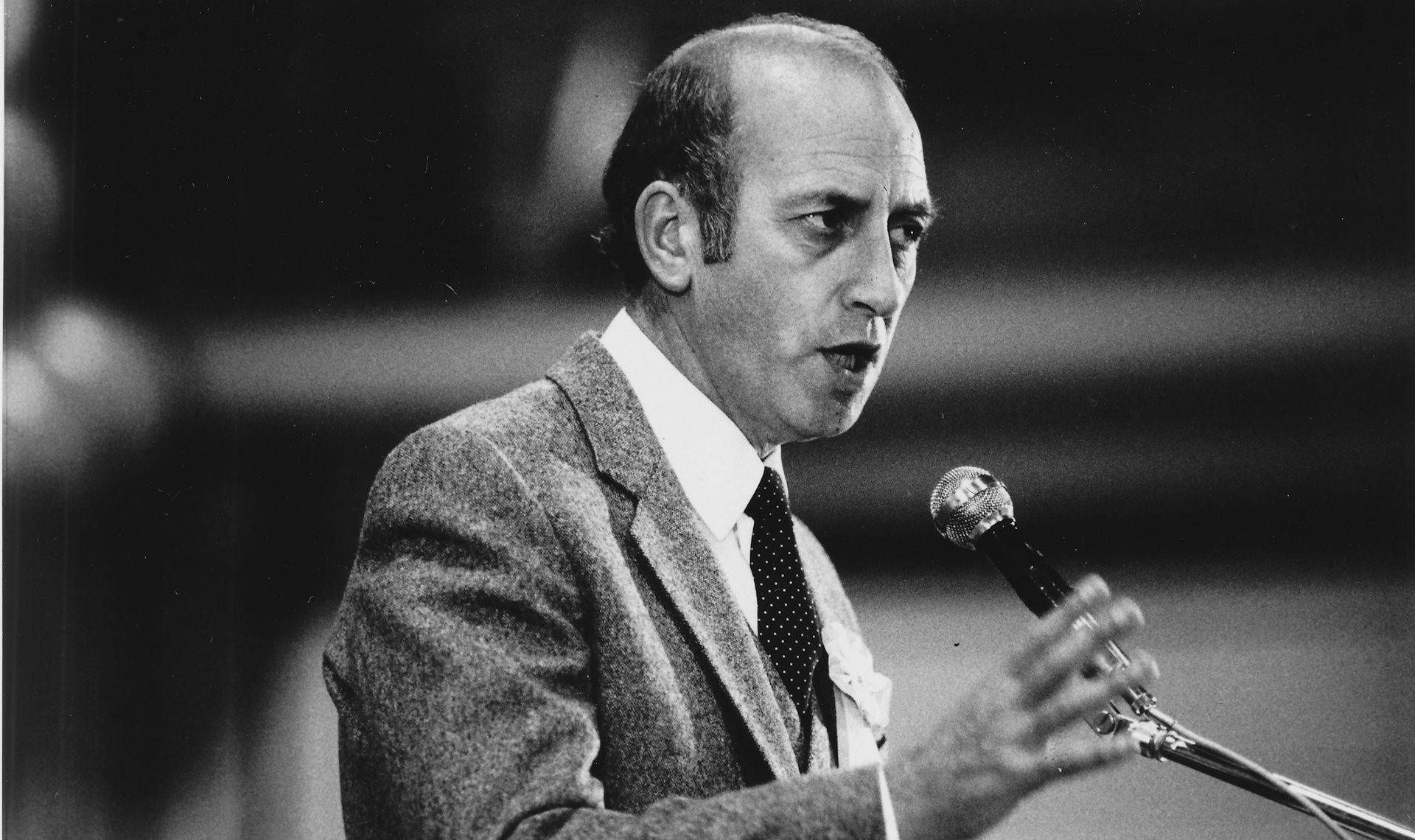Young Bob Jones at microphone delivering campaign speech 