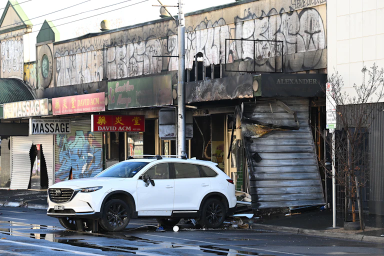 shops engulfed by fire after a tobacco shop was set alight