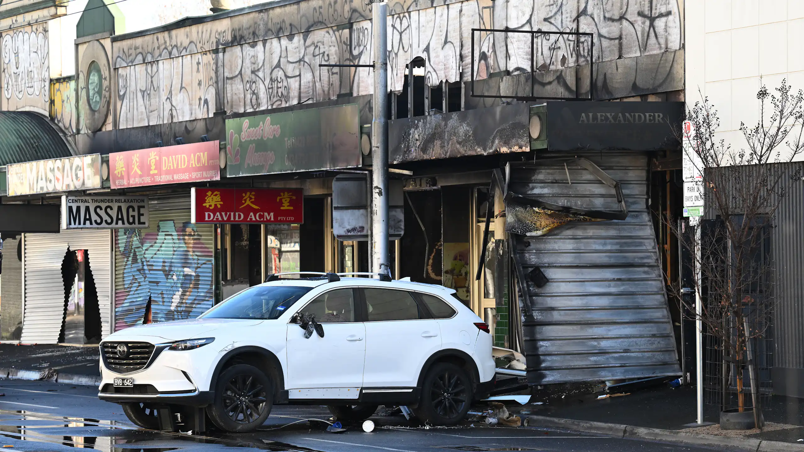 shops engulfed by fire after a tobacco shop was set alight