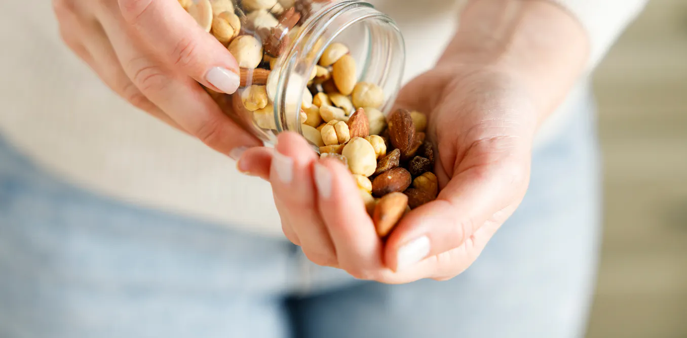 Eating a handful of nuts each day is linked with lower risk of high blood pressure, our research shows Eating a handful of nuts each day is linked with lower risk of high blood pressure, our research shows