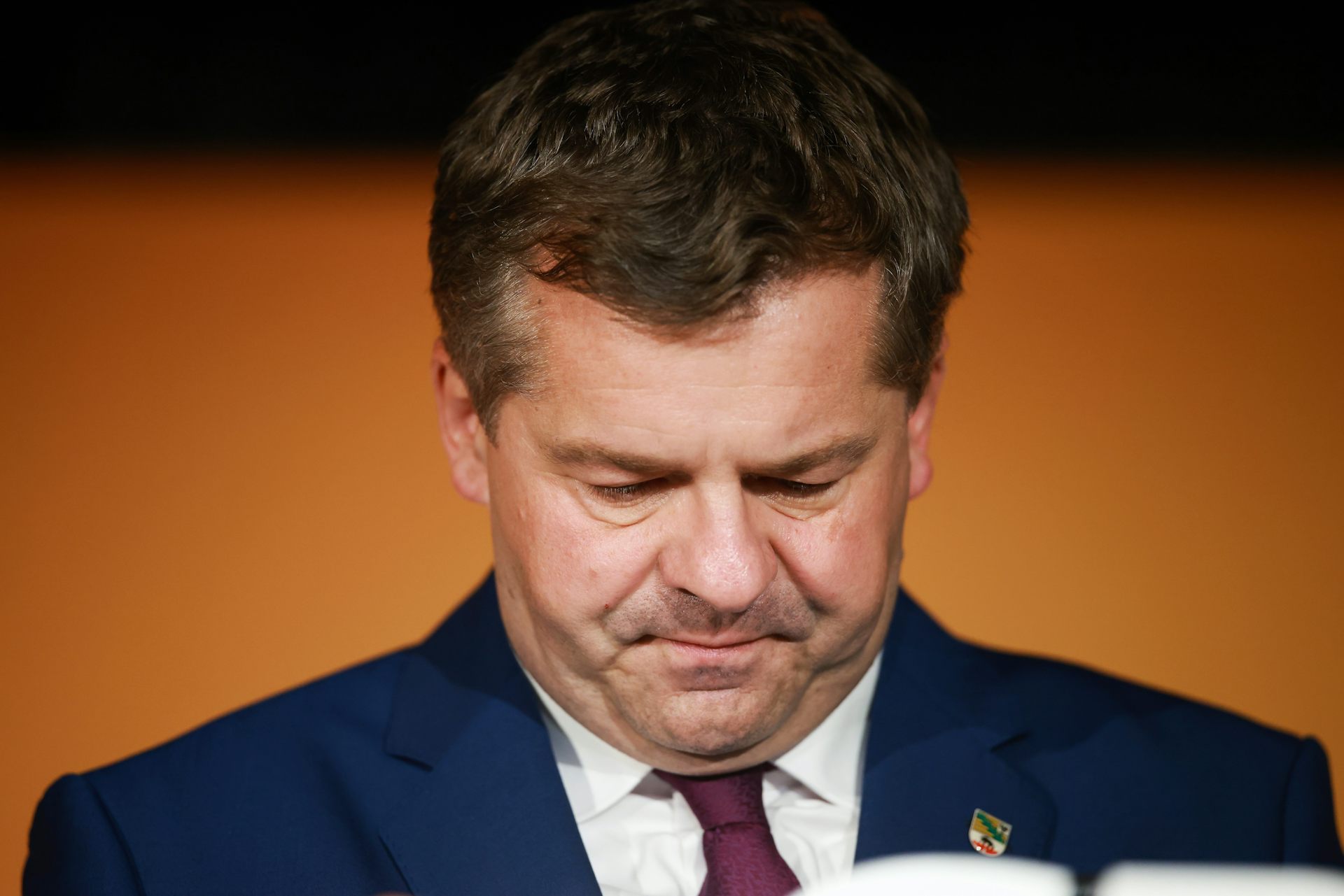 Sven Schulze looking dejected after seeing polling results.