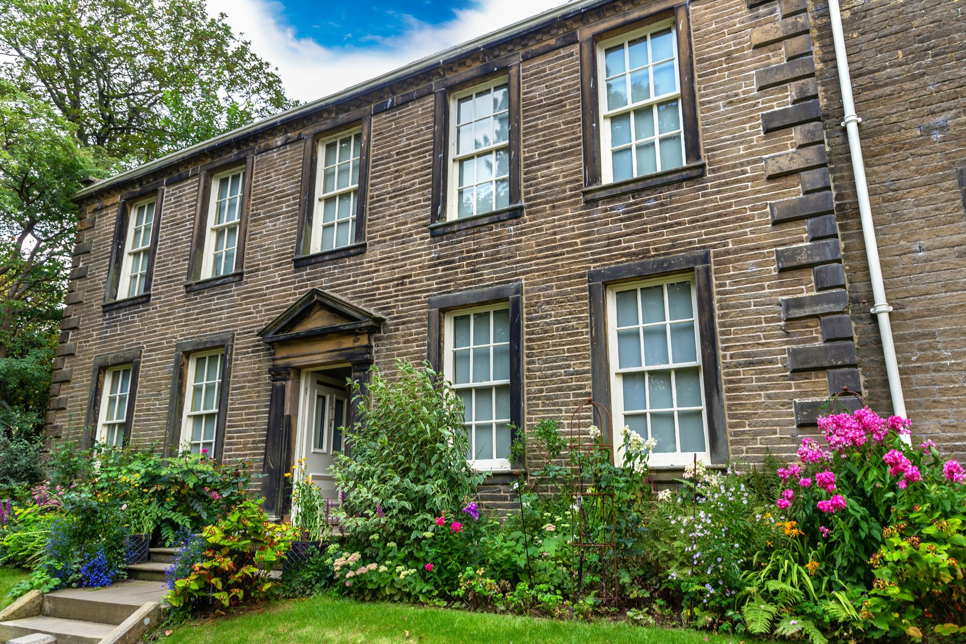Exterior of the Bronte Parsonage Museum in Haworth, the historic former home of the Bronte sisters in West Yorkshire,