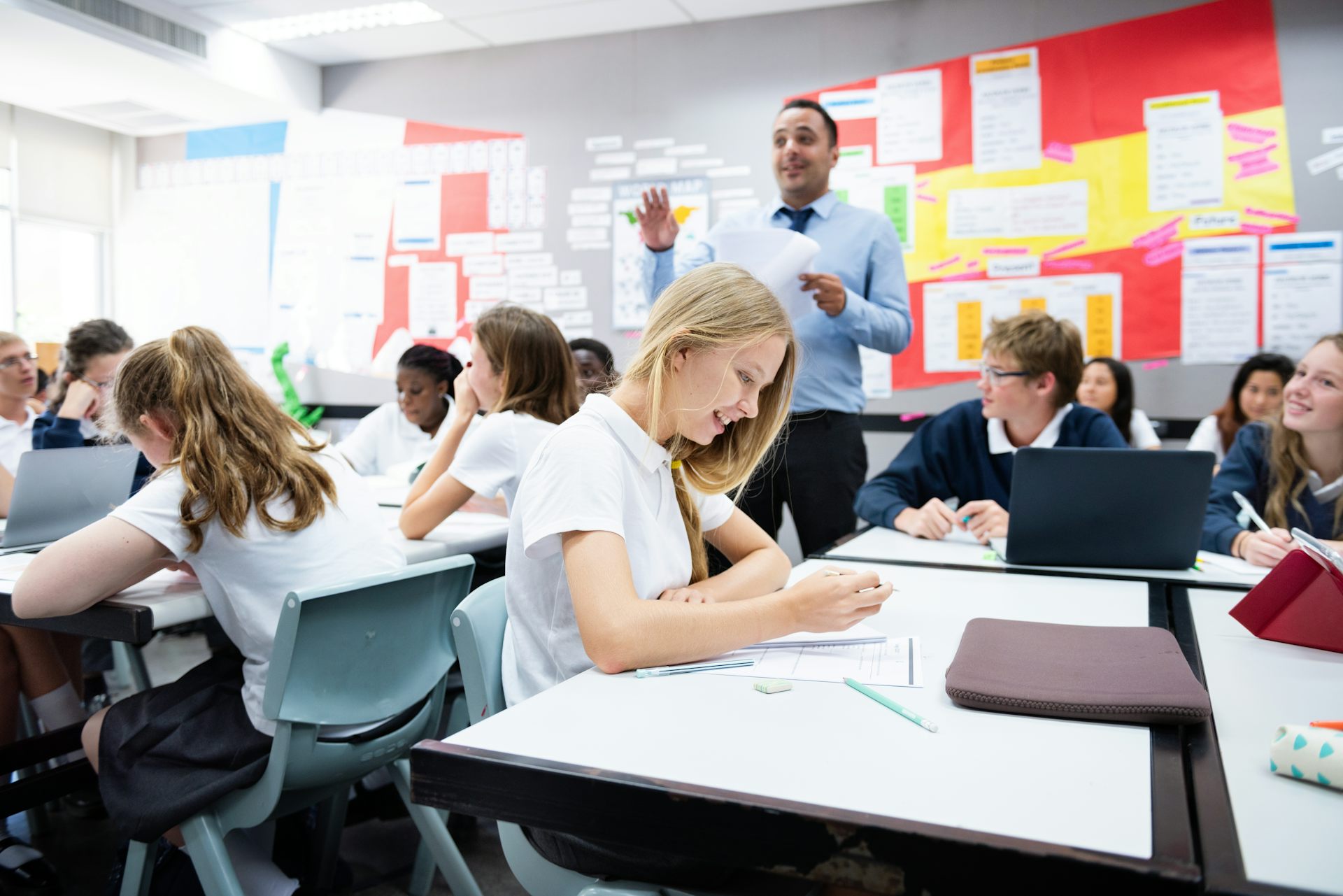 Teacher and pupils in classroom