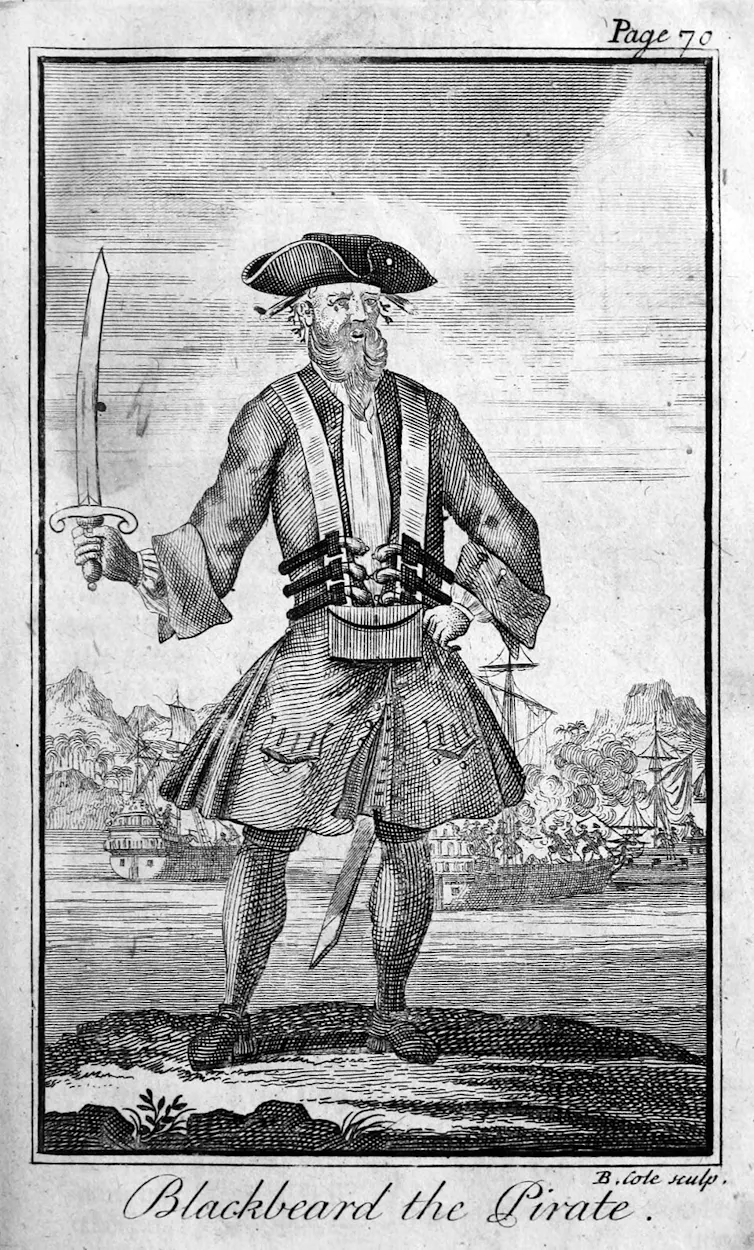 A black and white engraved, full-length portrait of 'Blackbeard the Pirate'
