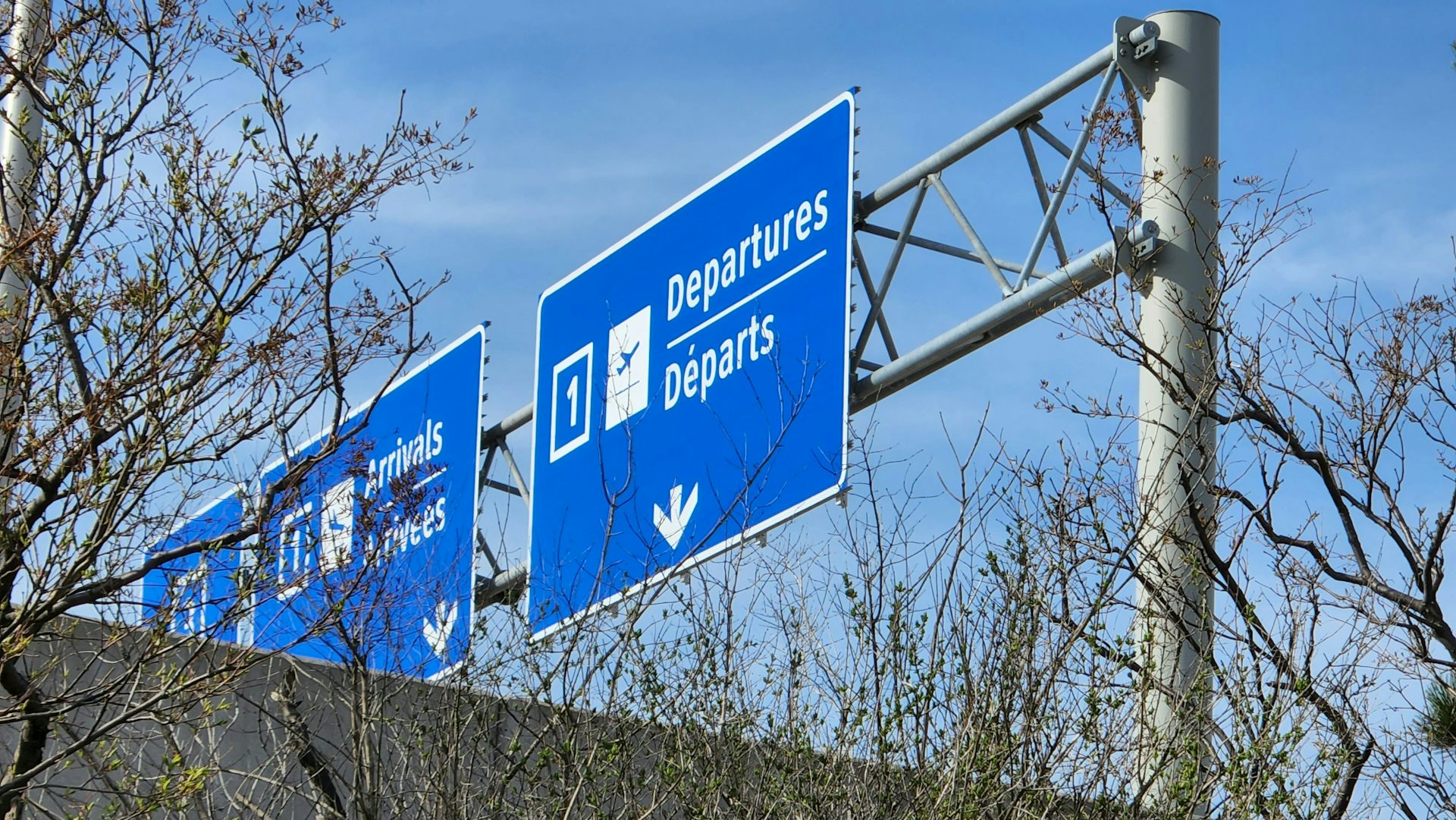 A departure sign on a road heading to Toronto's airport