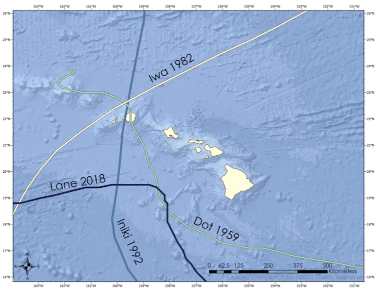 A map shows the paths of Hurricanes Iwa, Iniki, Lane and Dot across the Hawaiian Islands.