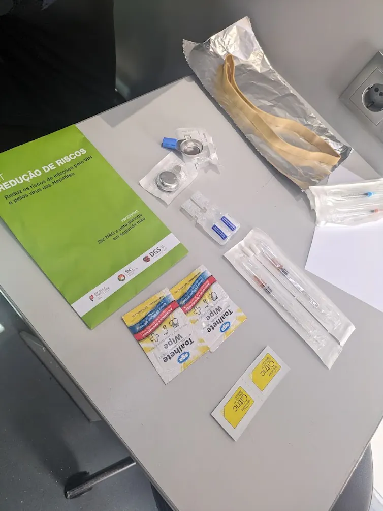 a small table with a clean injection kit laid out