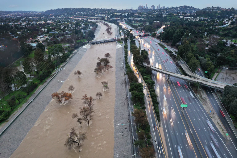 A photos shows the flooded river.
