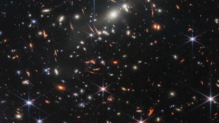 A photo showing thousands of galaxies in a night sky.