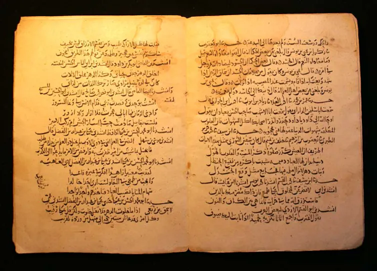 An old manuscript written in Arabic on yellowed paper