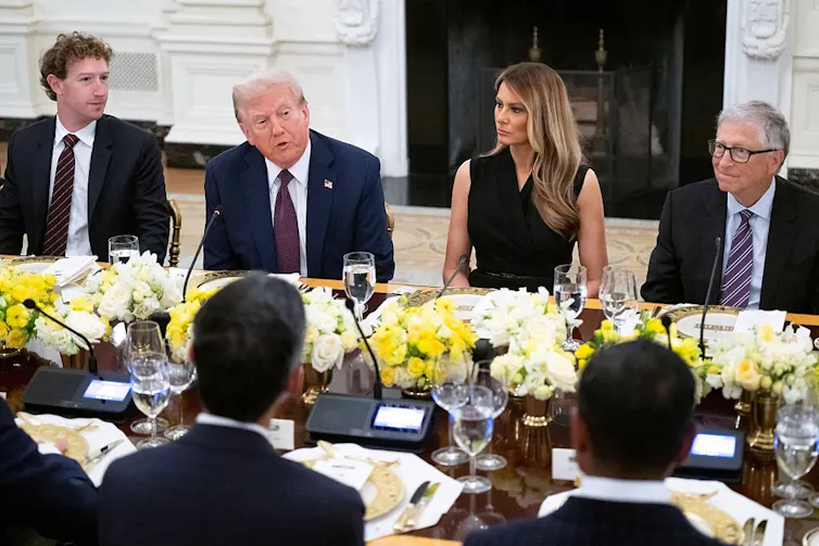 US President Donald Trump and First Lady Melania Trump host tech leaders, including Facebook founder Mark Zuckerberg (L) and Microsoft founder Bill Gates (R) for a dinner i