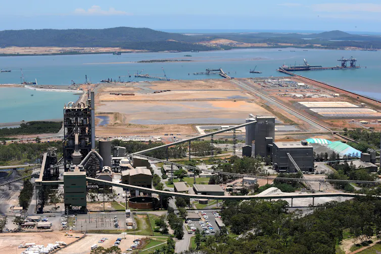 cranes and construction, gas plant on island.