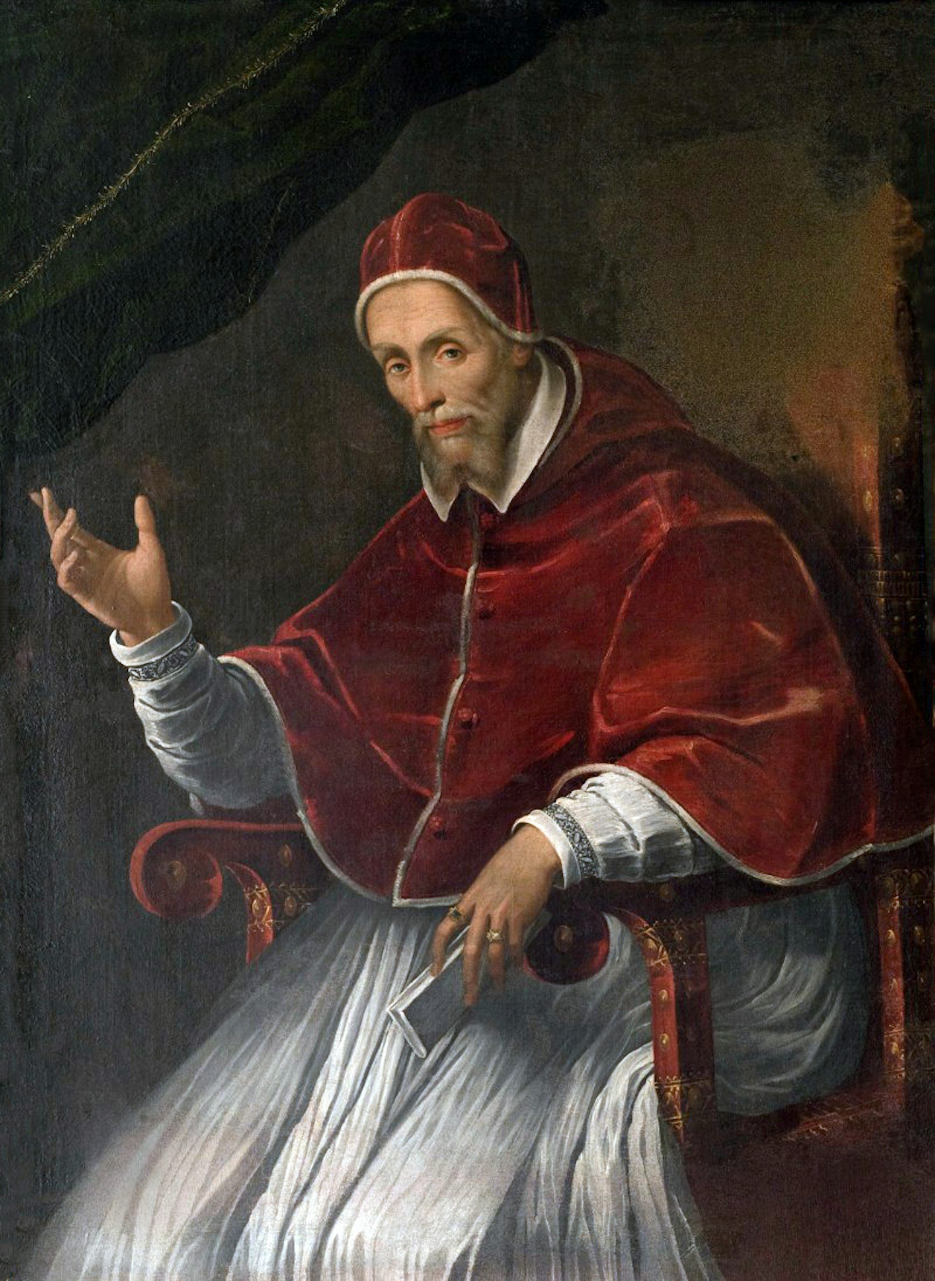 A picture of Pope Gregory XIV sitting with a raised hand waving
