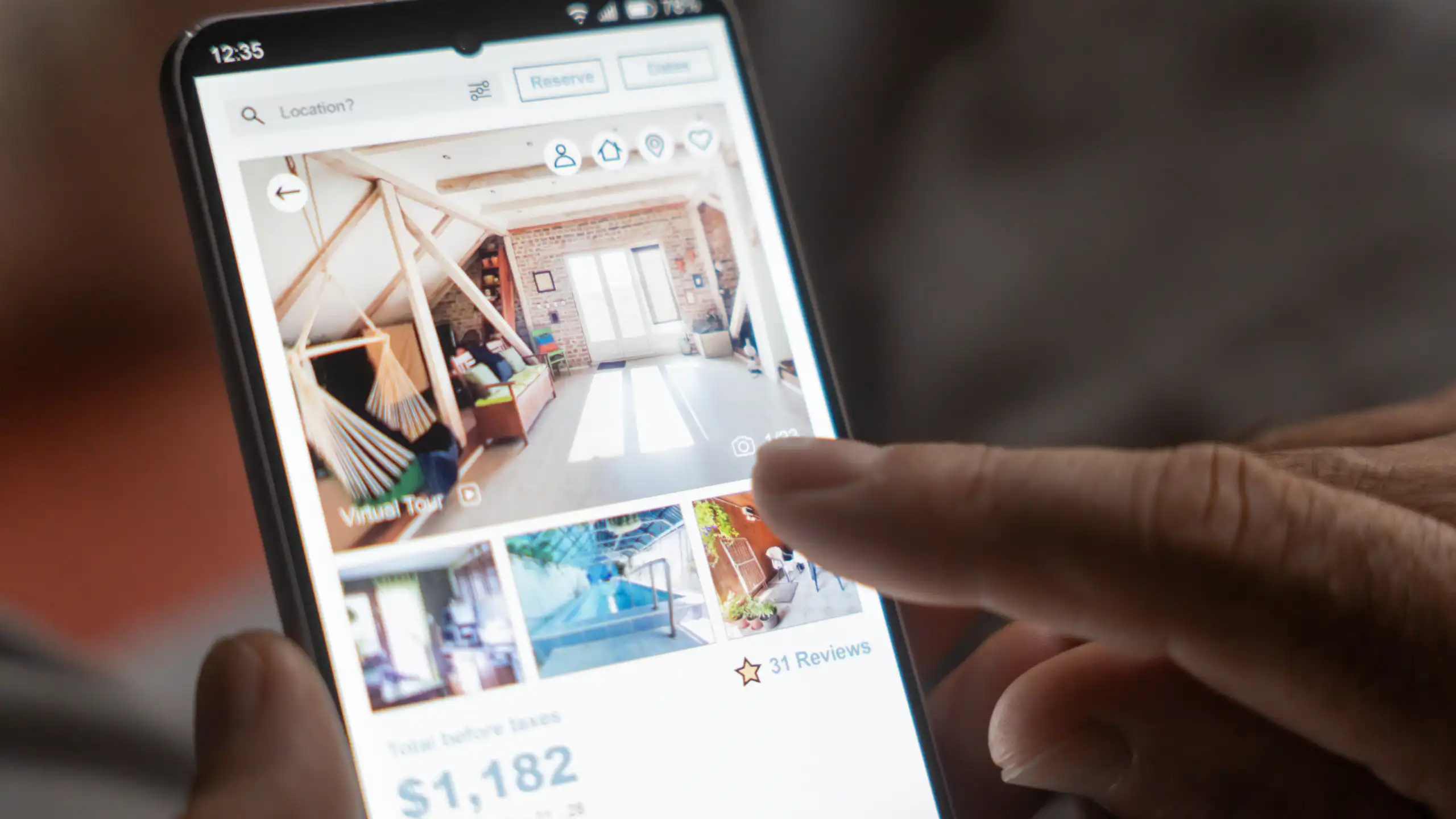 Person looking at real esate app on phone