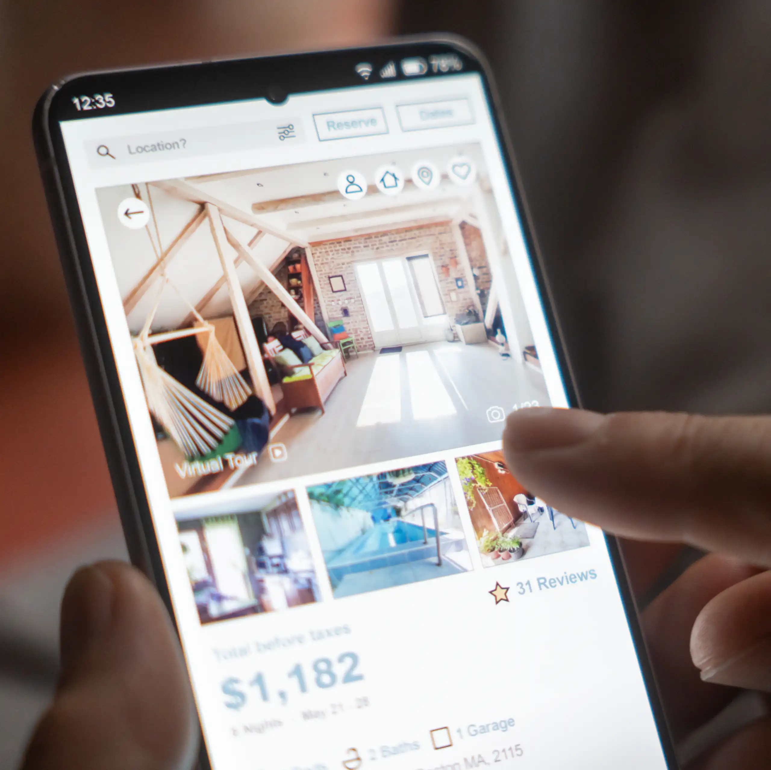 Person looking at real esate app on phone