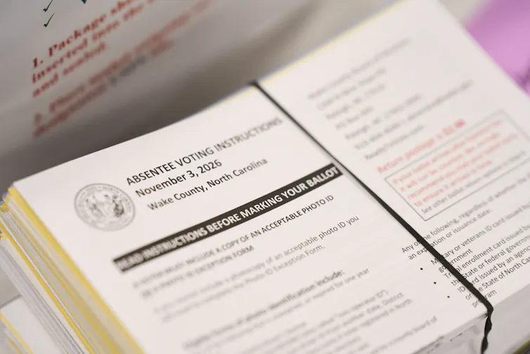 A pile of official instruction cards for mail-in ballots.