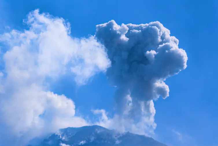 Volcanic eruption with a cloud of smoke in the sky