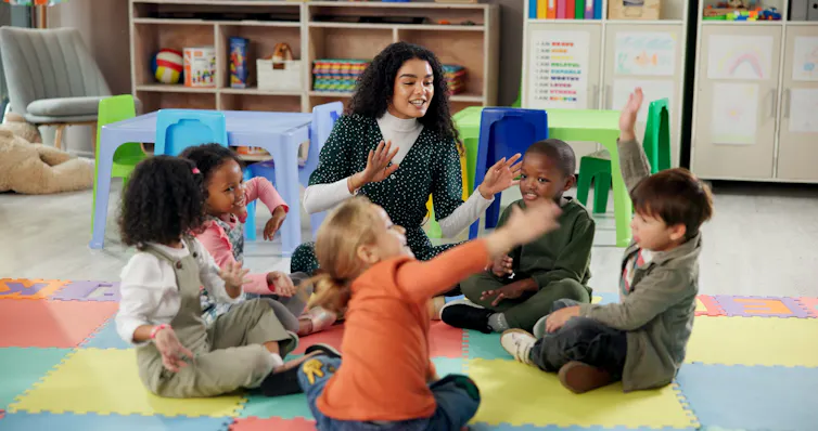 Children and teacher at nursery