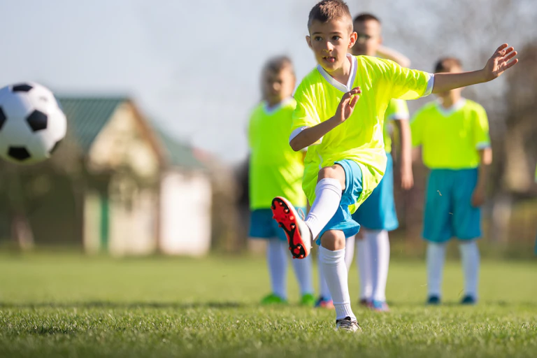 Children doing football drills