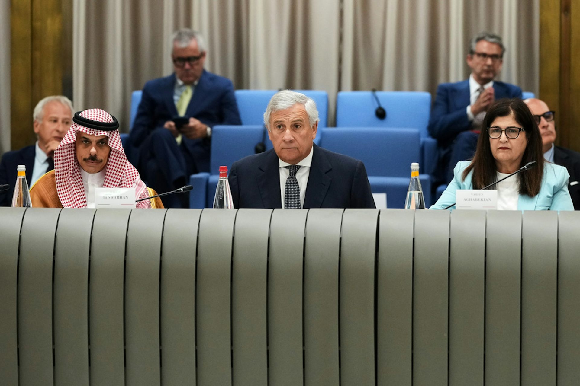 Government officials gather at a forum.
