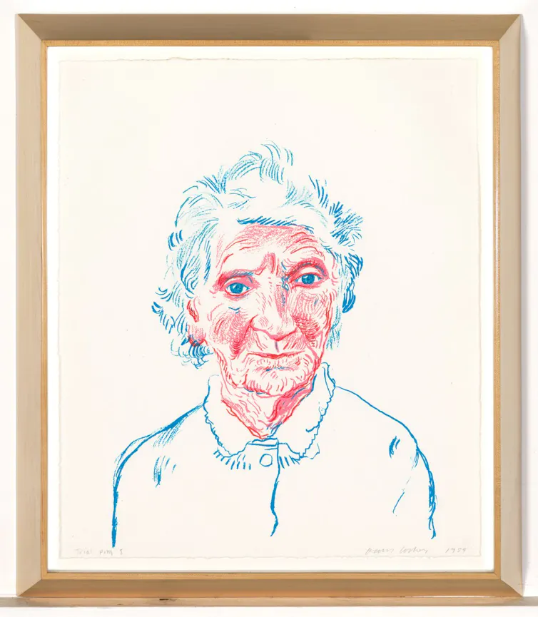 Framed portrait of an older woman, in pink and blue tones.