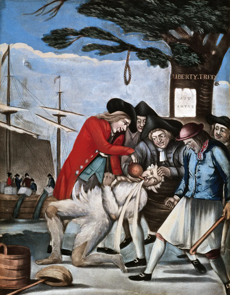 An illustration of U.S. colonists tarring a fellow colonists.