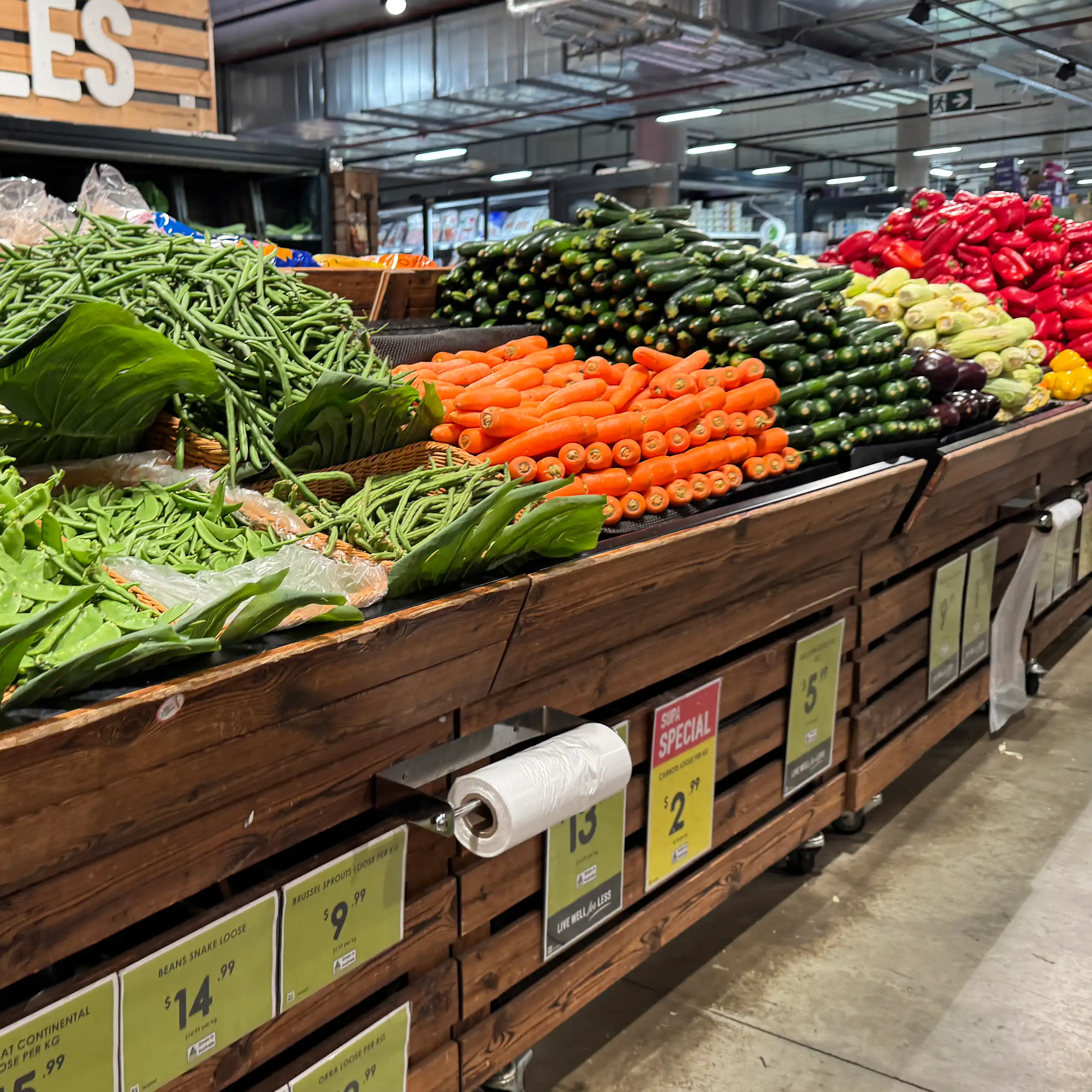 produce is seen in the fruit and vegetables section of a supermarket