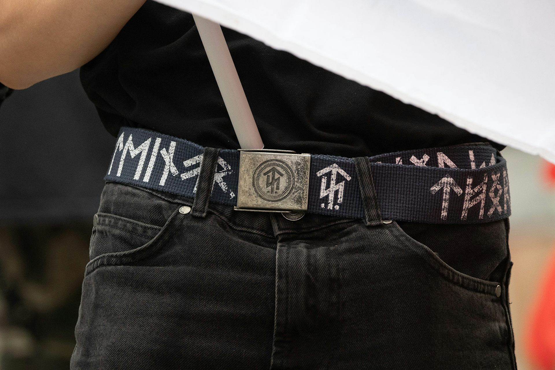 A belt with Nordic runic signs worn at a neo-Nazi rally.