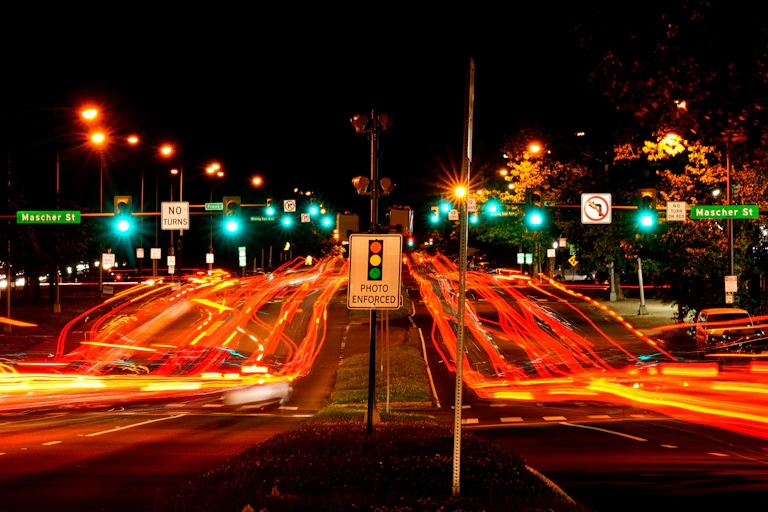 Blurred vehicle ights on a major road in urban area at night