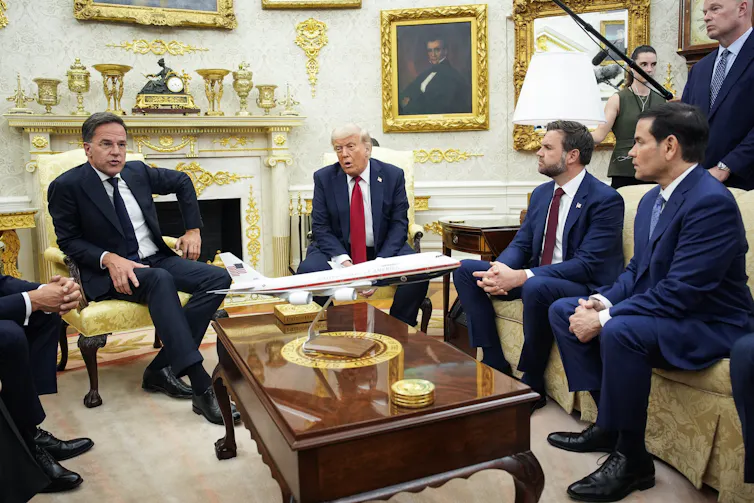 President Donald Trump (2-L) meets with NATO Secretary General Mark Rutte (L), Vice President JD Vance (2-R) and United States Secretary of State Marco Rubio (R) in the Oval Office of the White House in Washington, DC, USA, 14 July 2025.