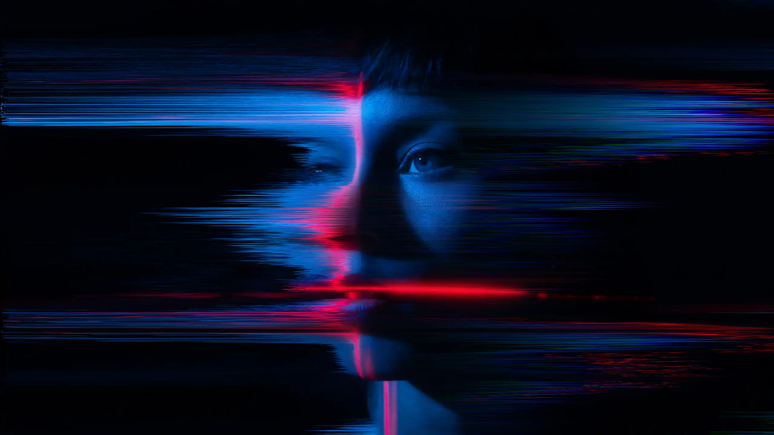 A woman's face digitally edited to appear as if it's dissolving.