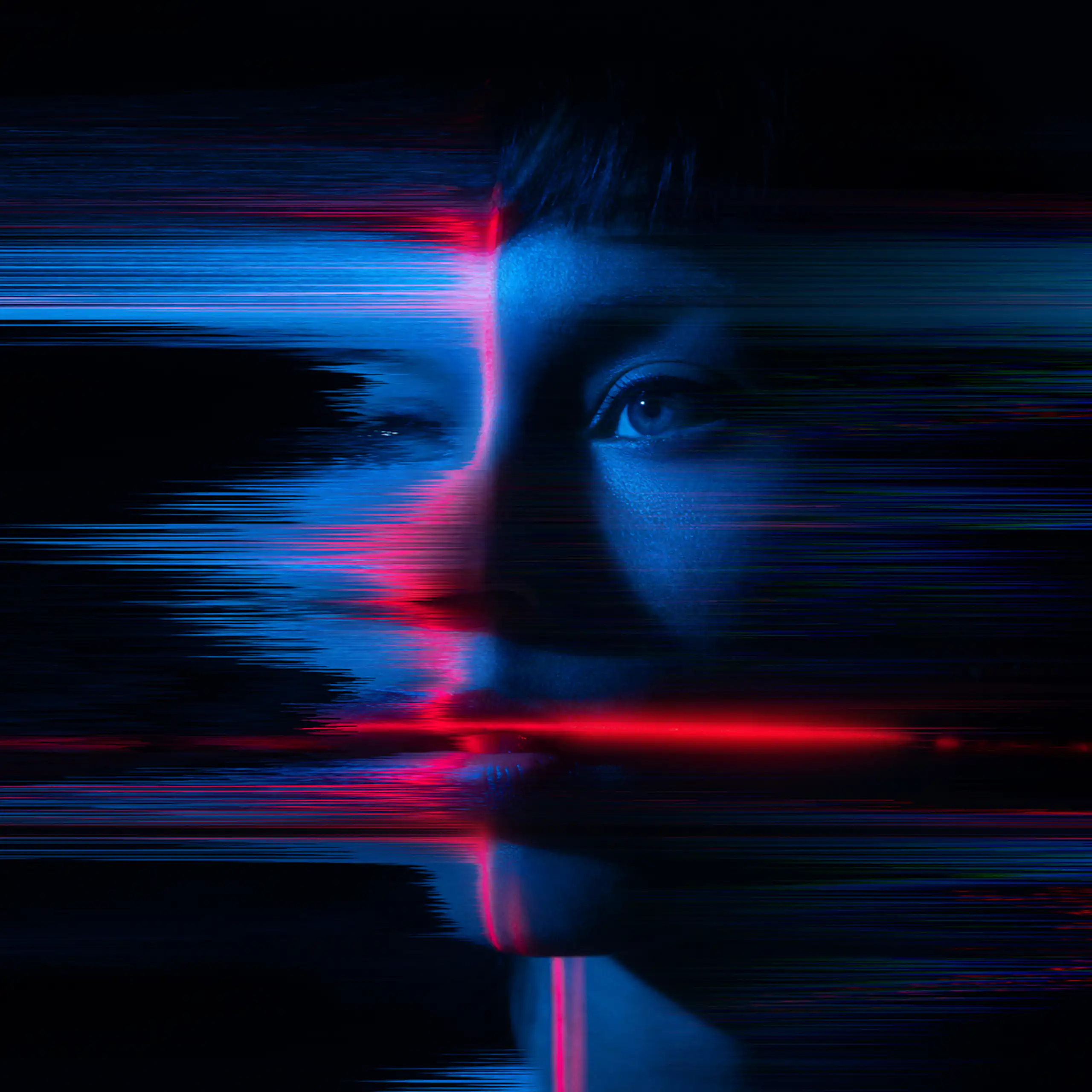 A woman's face digitally edited to appear as if it's dissolving.