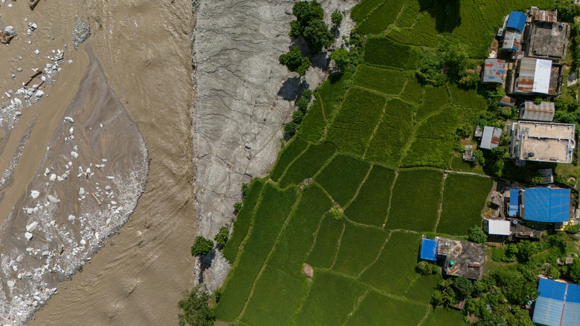 Farmers fields alongside a large muddy expanse