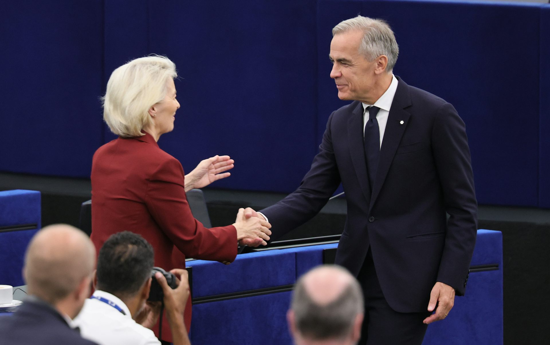 Mark Carney shakes hands with Ursula von der Leyen at the European Parliament.