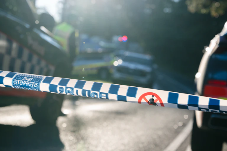 Police cars and officers are seen at the scene of an alleged domestic violence incident in NSW>
