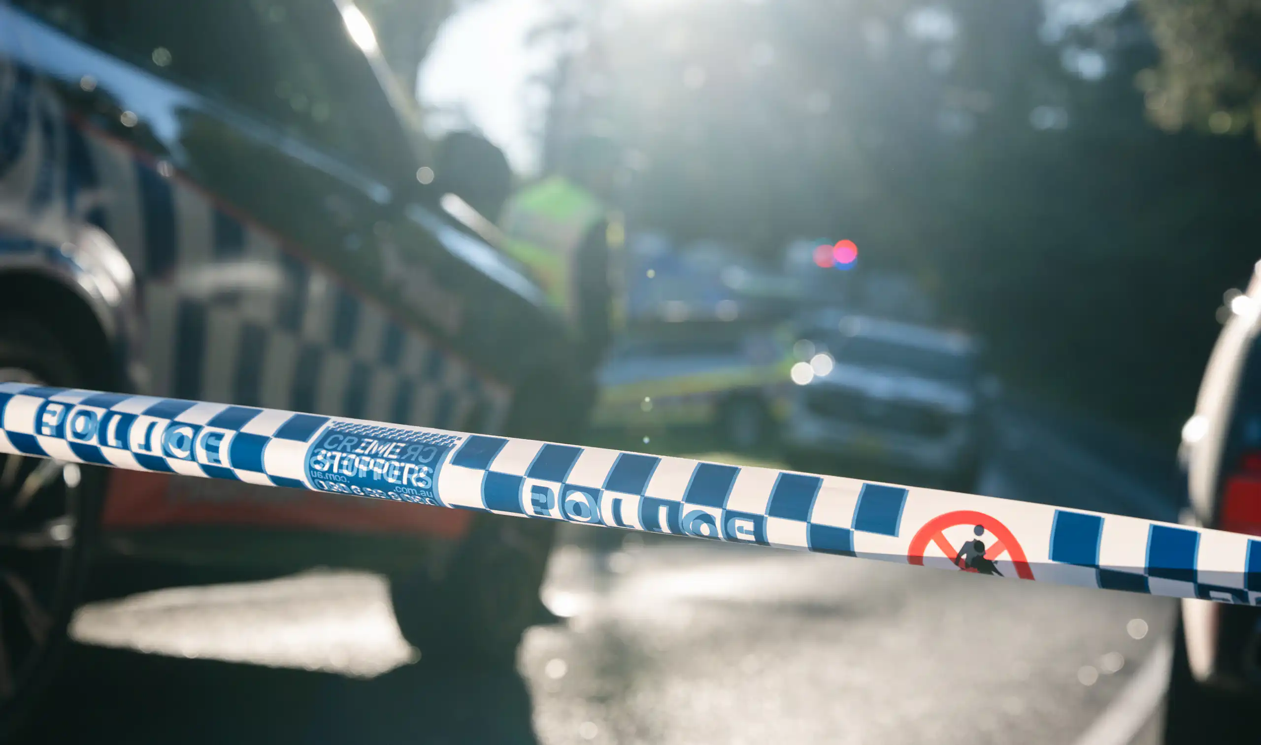 Police cars and officers are seen at the scene of an alleged domestic violence incident in NSW>